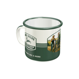 Angled view of a white and green enamel mug with a John Deere logo and a vintage illustration of a farmer next to a tractor.