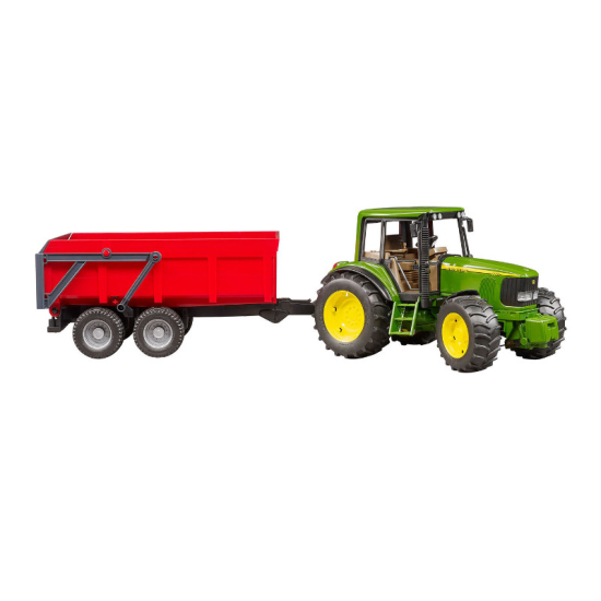Side view of a green John Deere tractor with yellow wheels attached to a red dump trailer.